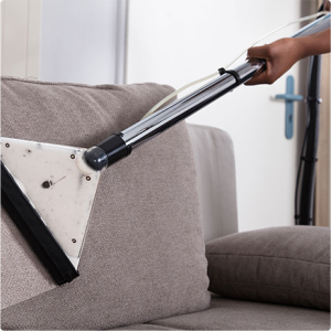sofa getting steam cleaned